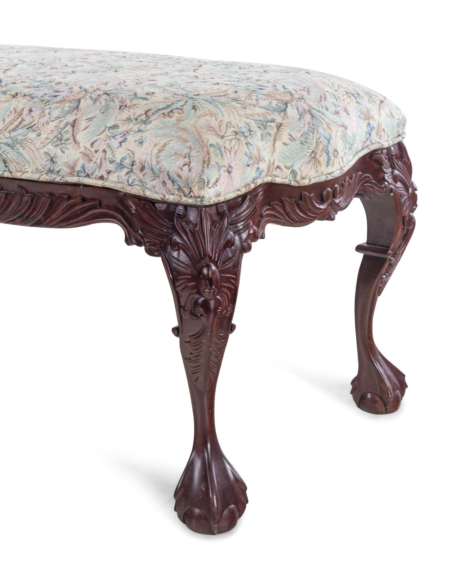 An Indonesian Carved Mahogany Bench