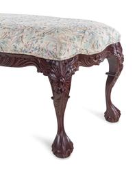 An Indonesian Carved Mahogany Bench
