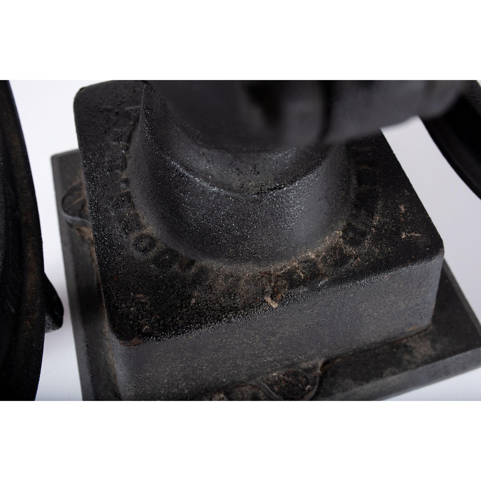 A Landers, Frary & Clark Cast Iron Coffee Mill with an Eagle Finial