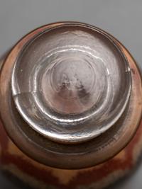 An Early Andrew Clemens (American, 1857-1894) Eagle Sand Bottle