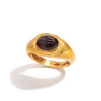 A Roman Gold and Garnet Finger Ring with the Goddesses Athena and Nike