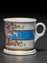 A Porcelain Shaving Mug Depicting a Tandem Bicycle, Possibly Belonging to Charles and Anna Kohlmeyer