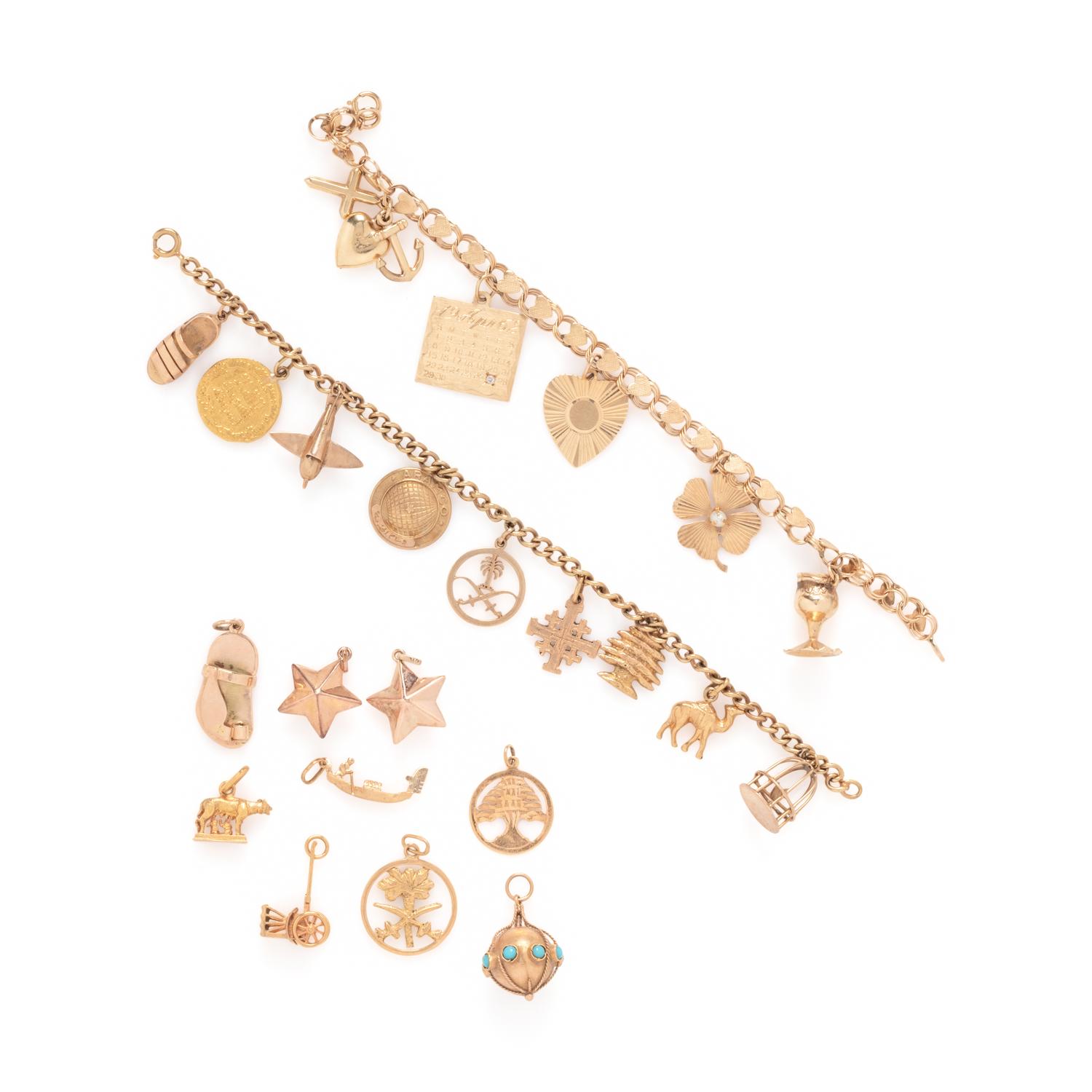 COLLECTION OF YELLOW GOLD CHARM BRACELETS