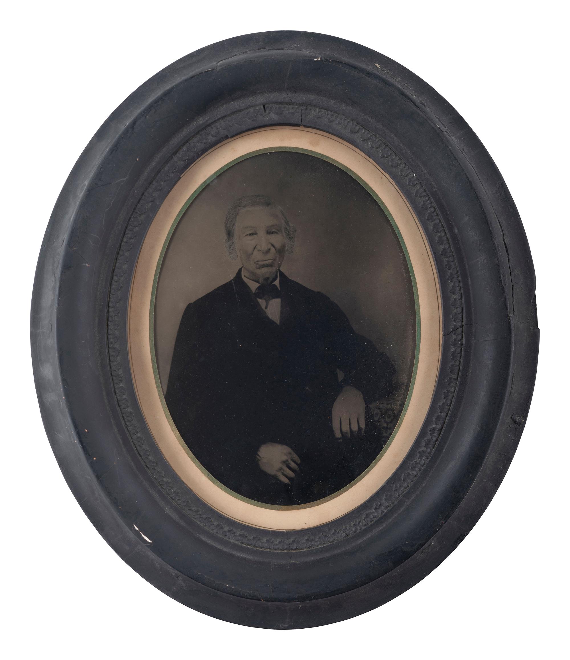 [EARLY PHOTOGRAPHY]. Full plate tintype of a possibly mixed-race gentleman in period frame.