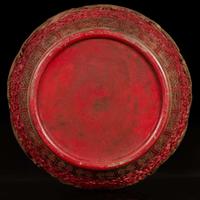 A massive Chinese faux cinnabar lacquer modeled porcelain "Dragons" jardinière 朱紅漆繪模印龍紋缸 Qianlong six character mark in relief to the neck ?????