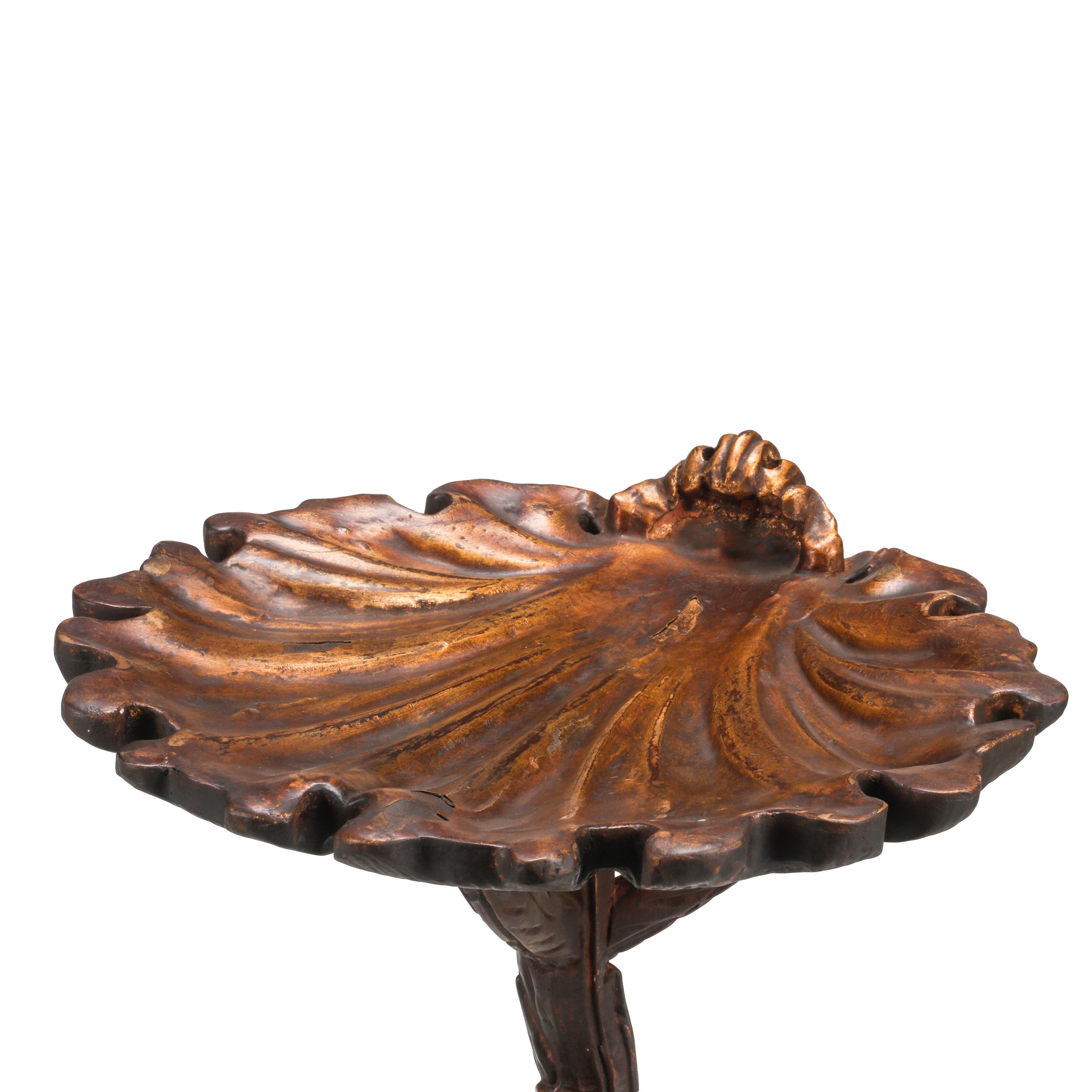 A Pair of Italian Carved and Parcel Gilt "Grotto" Style Tables