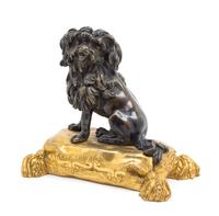 A French Gilt and Patinated Bronze Table Ornament Height 8 inches.