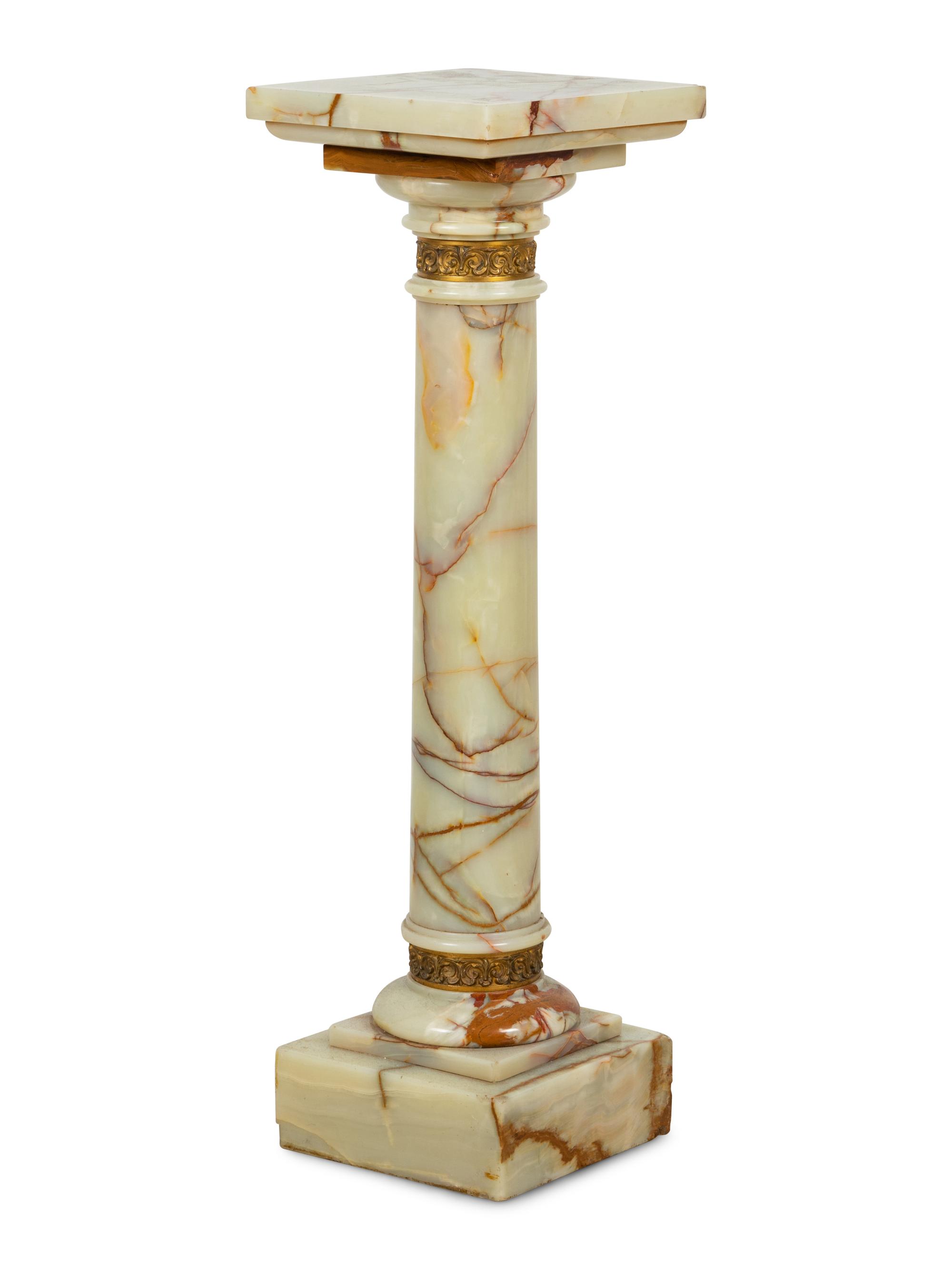 A Continental Gilt Bronze Mounted Onyx Pedestal