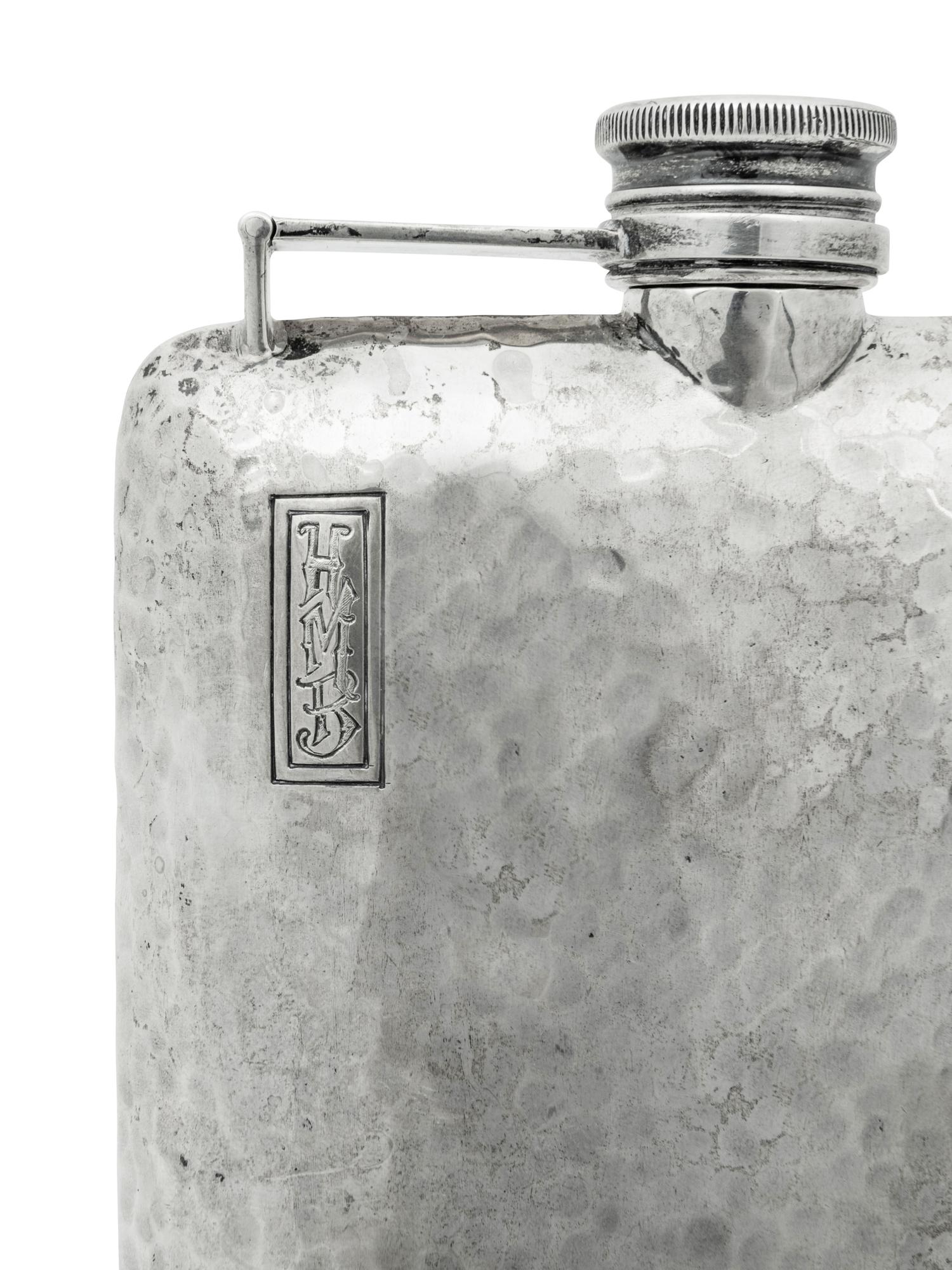 An International Hammered Silver Flask