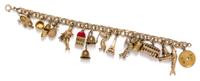 A 14 Karat Yellow Gold Charm Bracelet with 15 Attached Charms, 26.00 dwts