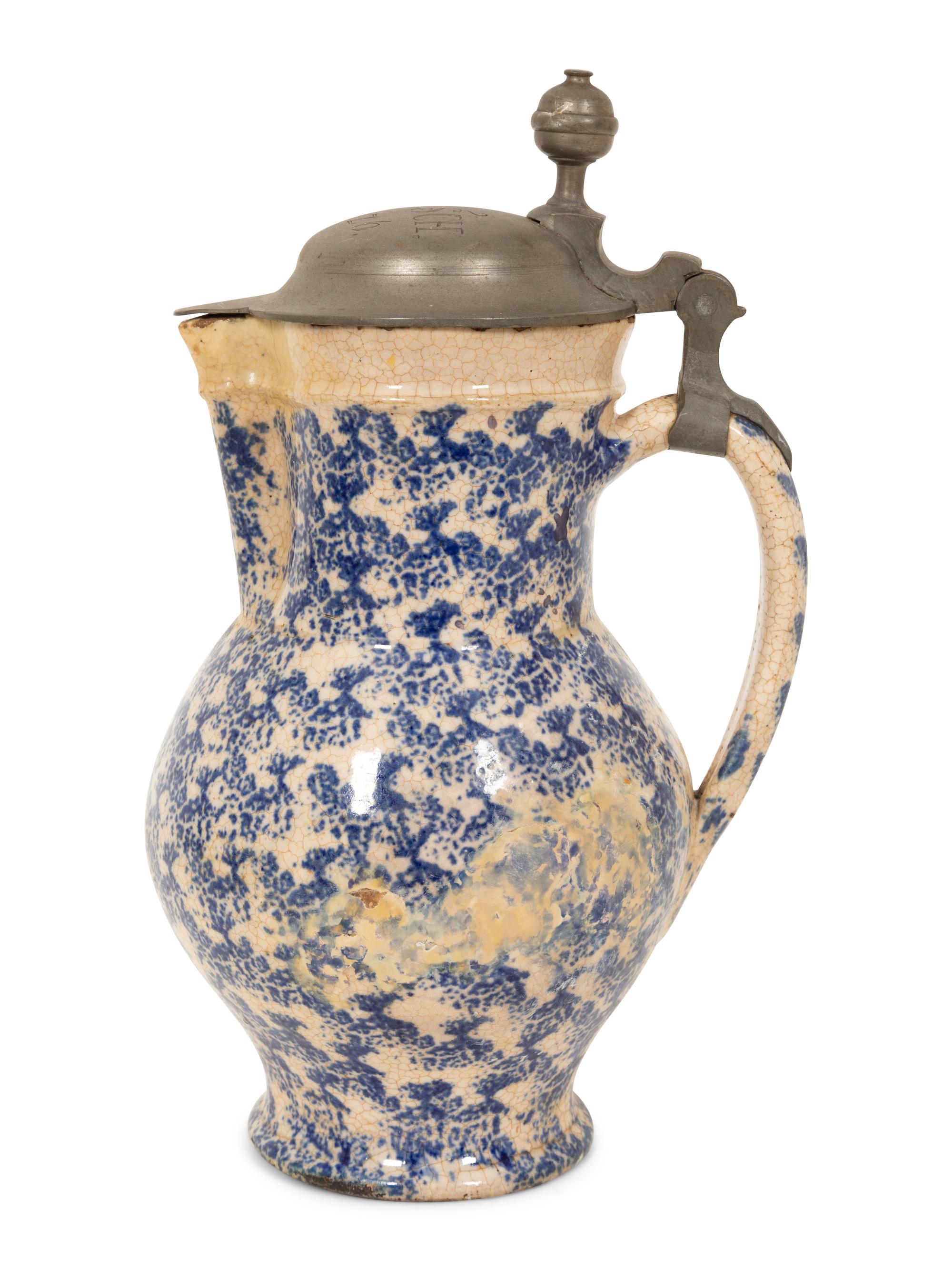 A Pewter Mounted Blue and White Spatterware Tankard