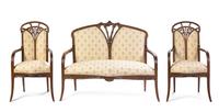 A French Art Nouveau Three Piece Carved Fruitwood Salon Suite, Louis Majorelle Length of settee 51 inches.
