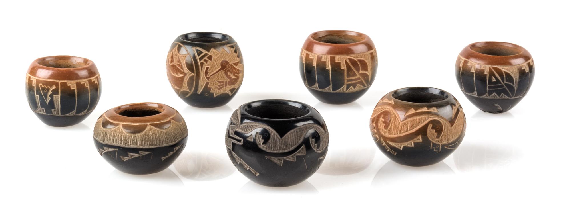 Seven Santa Clara Blackware Pottery Jars Height of tallest 7/8 inch. — Candelaria Suazo (b. late 1950s)