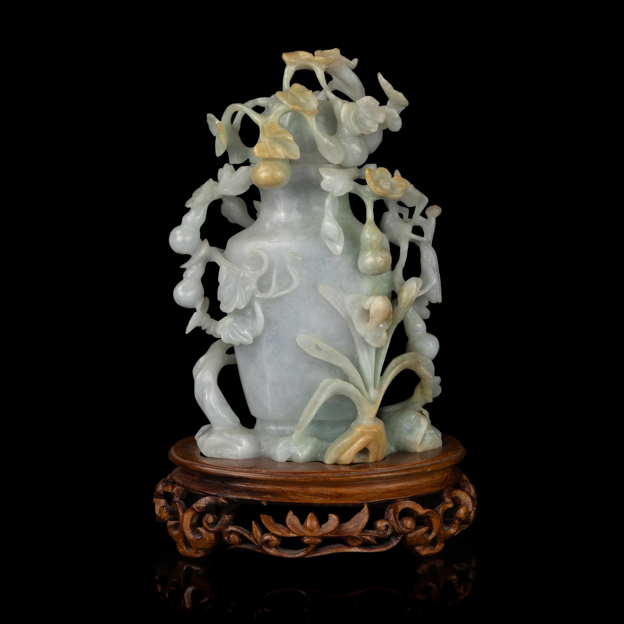 A Chinese Carved Openwork Jadeite Vase and Cover, Qing Dynasty 清 鏤雕翡翠賞瓶