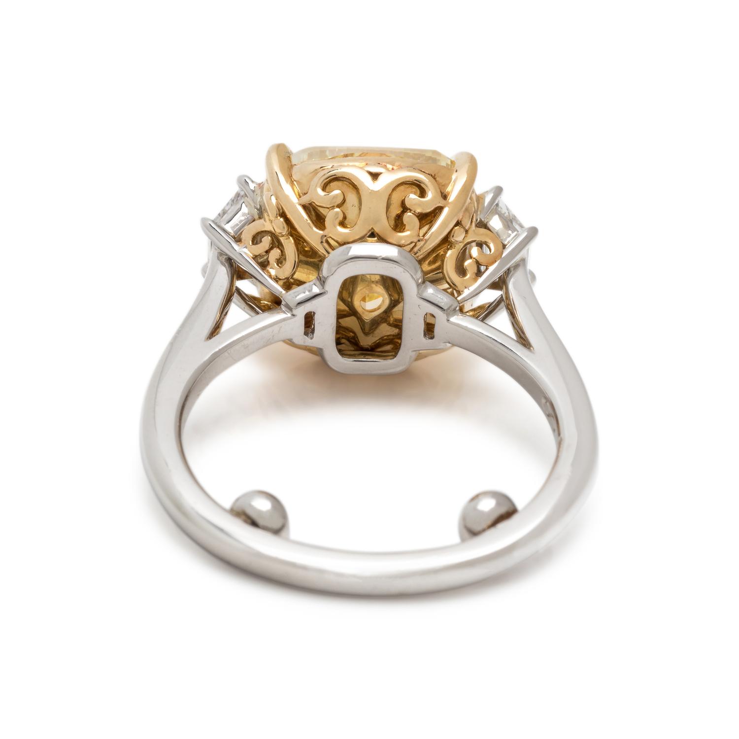 FOREVERMARK, FANCY YELLOW DIAMOND AND DIAMOND RING