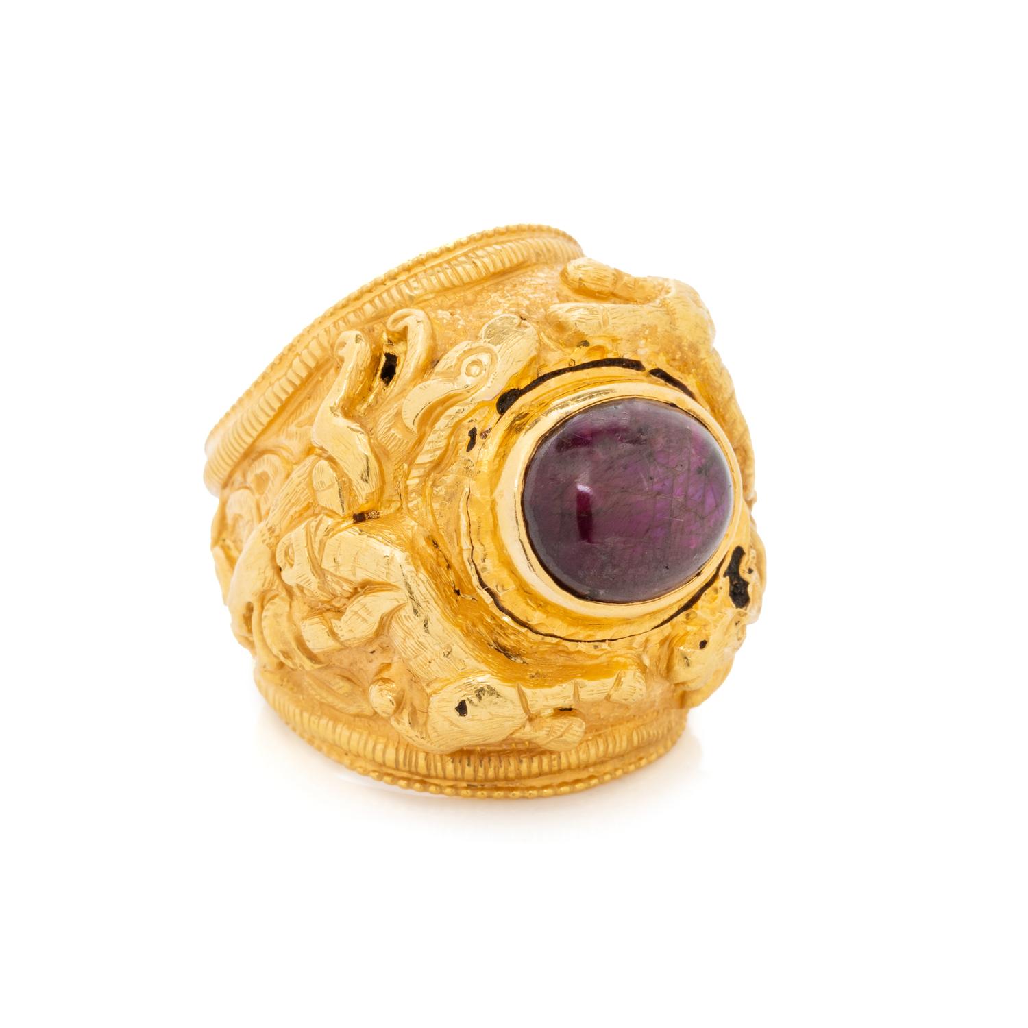 HIGH KARAT GOLD AND STAR RUBY RING