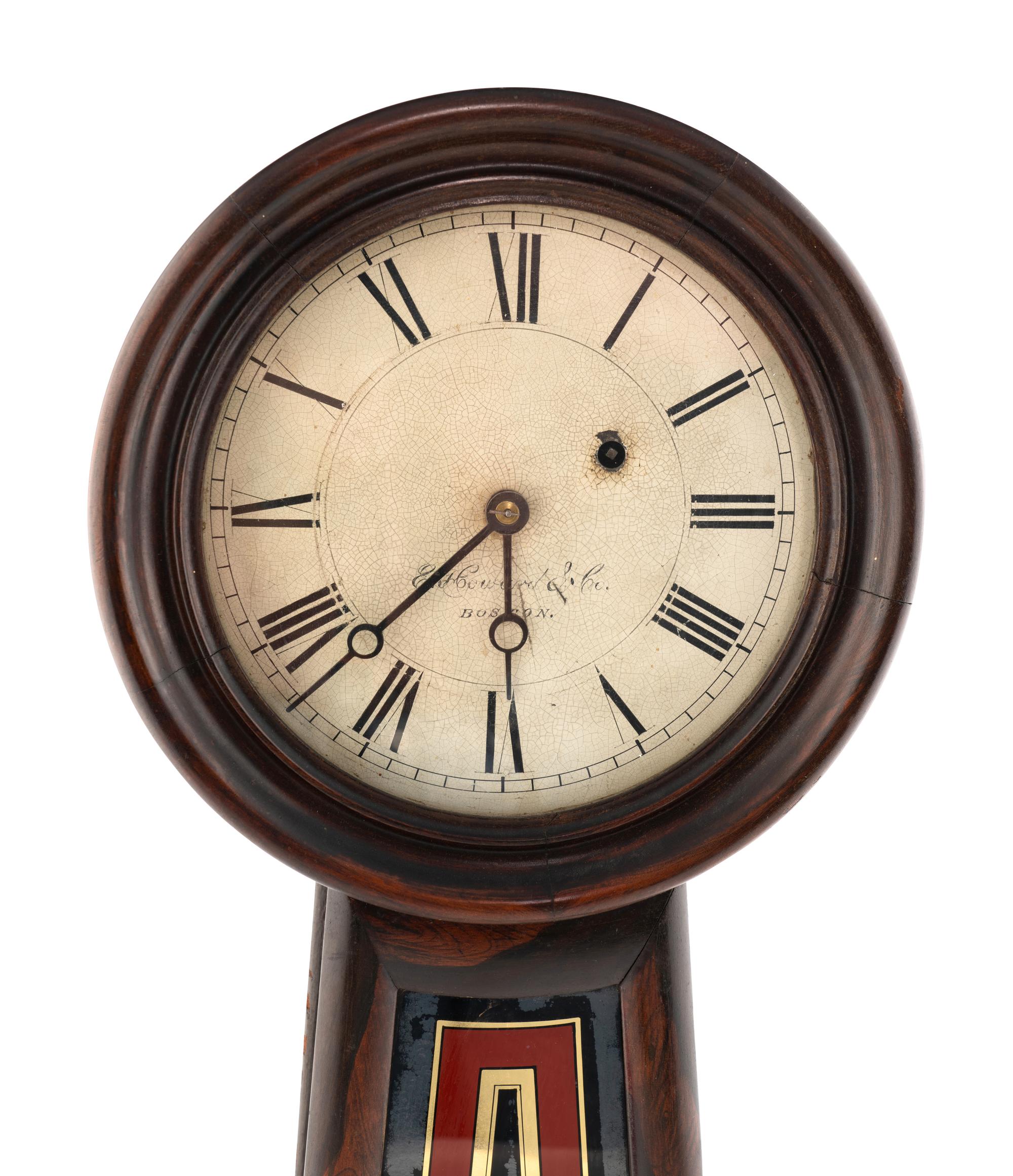 A Grain Painted and Eglomise Banjo Clock