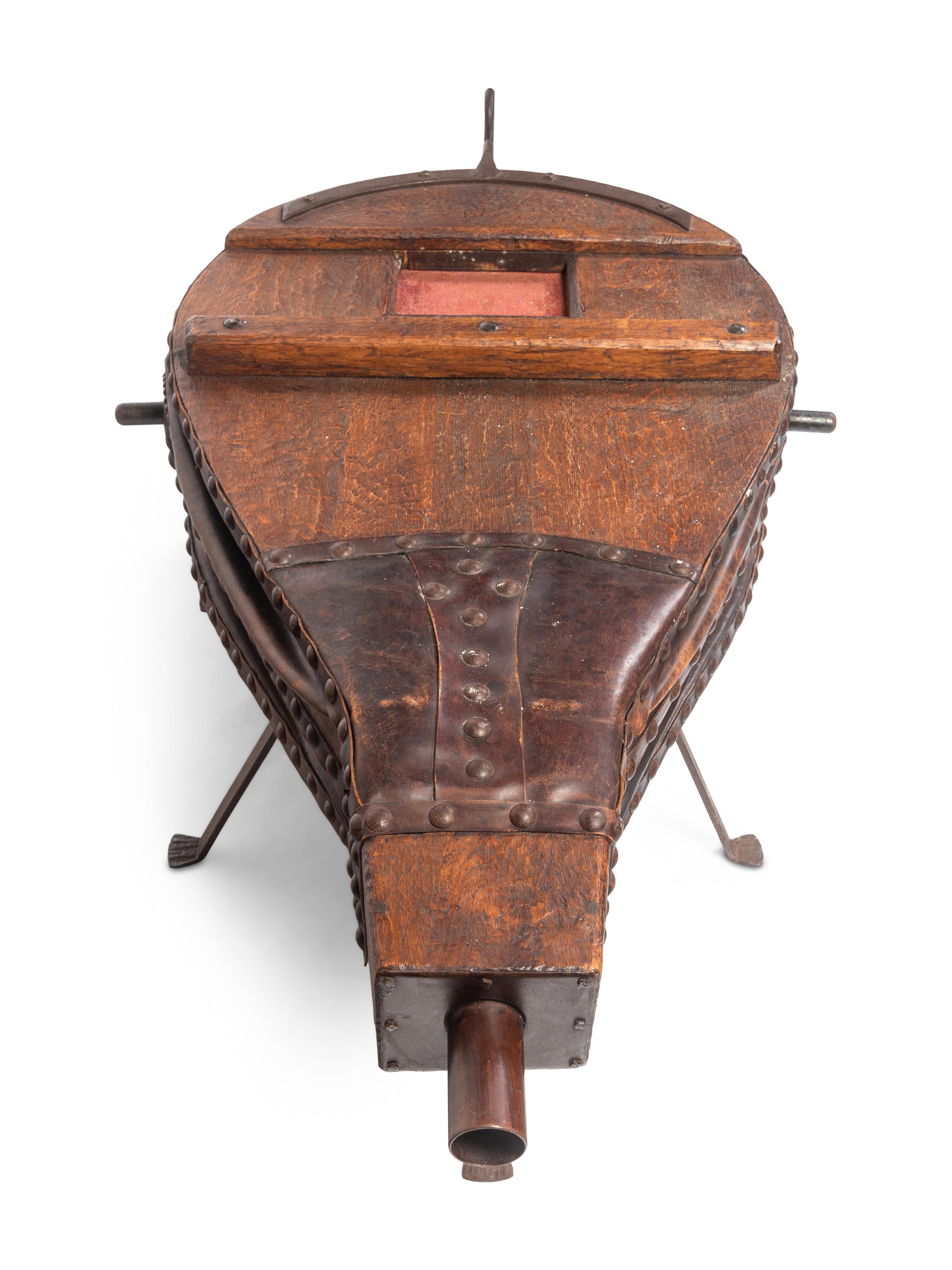 A Large Oak and Leather Bellows on Stand