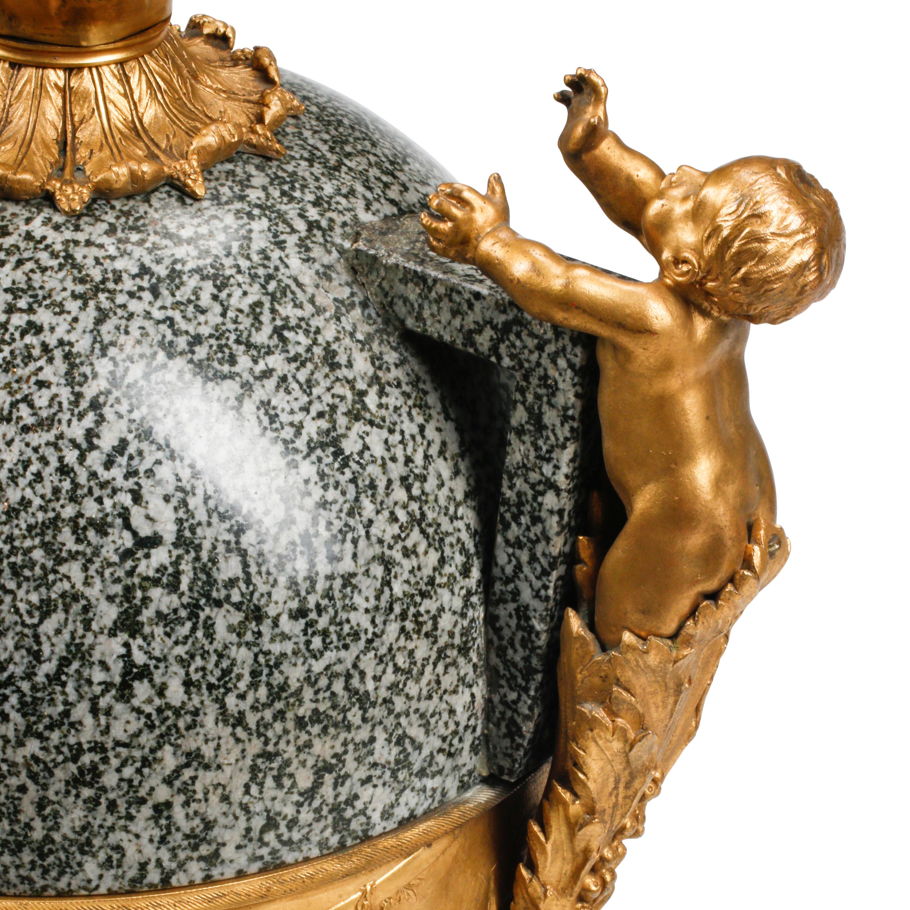A Pair of Large French Gilt Bronze Mounted Marble Urns