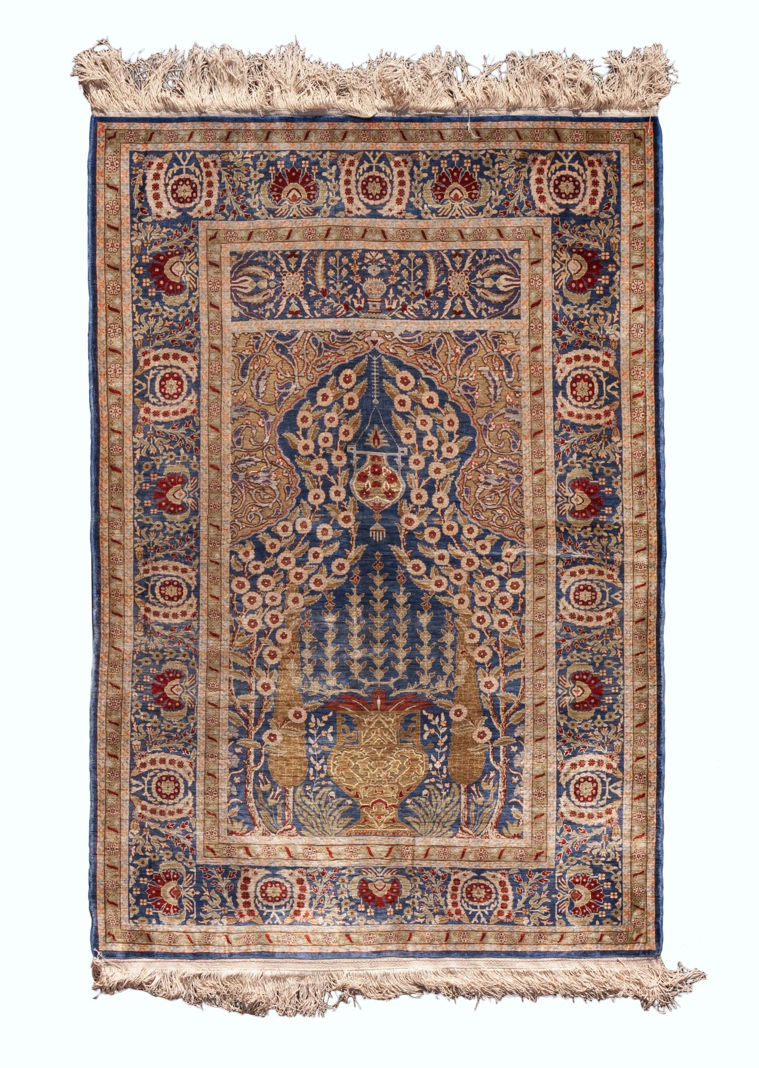 An Indo-Isfahan Silk Prayer Rug 4 feet 10 inches x 3 feet 4 inches. — SECOND HALF 20TH CENTURY