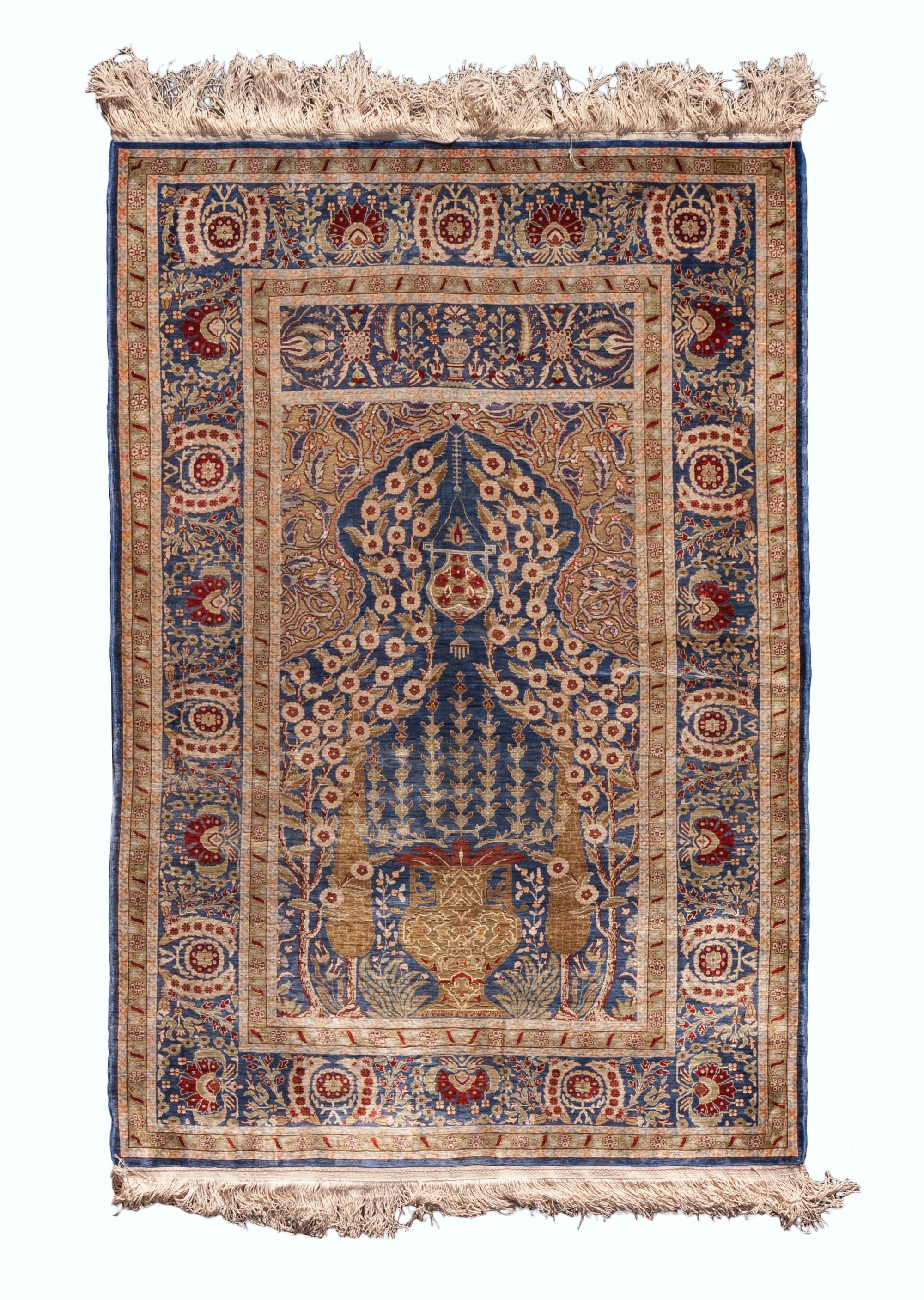 An Indo-Isfahan Silk Prayer Rug 4 feet 10 inches x 3 feet 4 inches. — SECOND HALF 20TH CENTURY