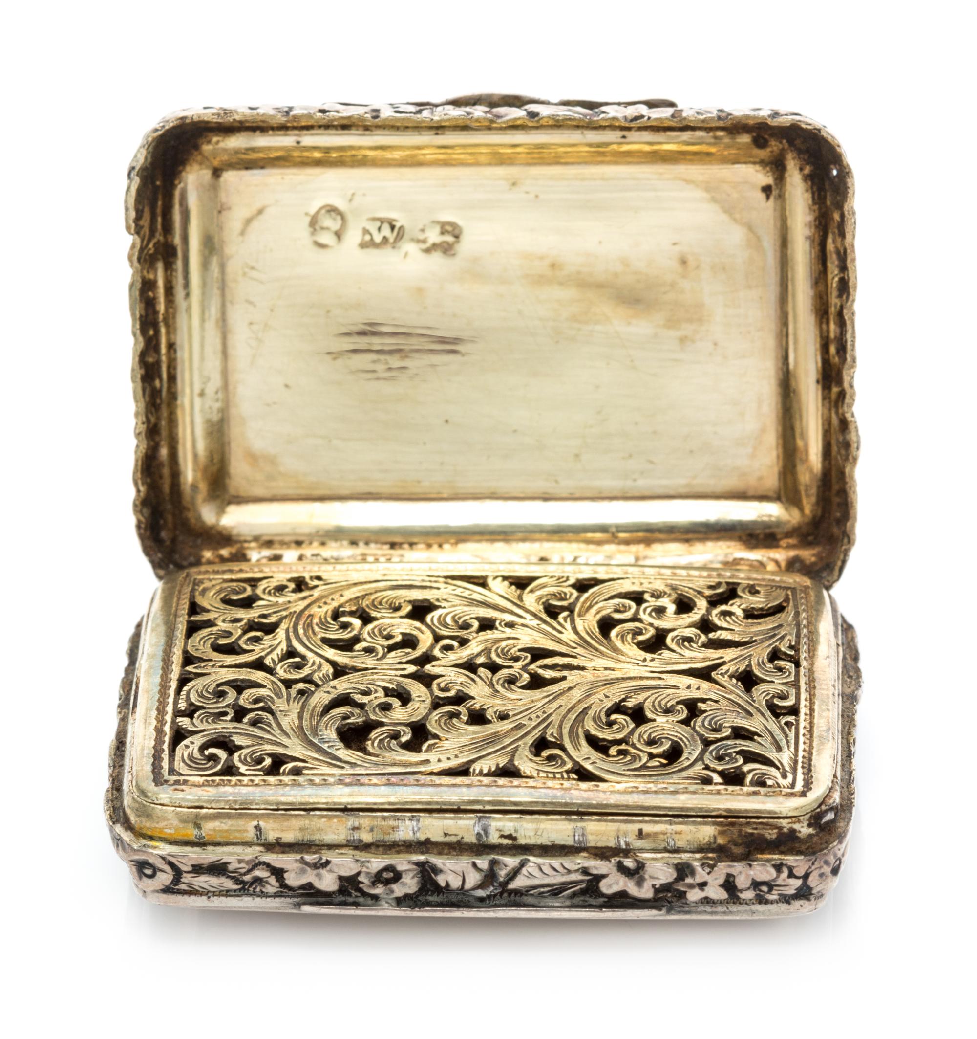 A George III Silver Vinaigrette, Joseph Willmore, Birmingham, 1817, the lid centered by a monogrammed cartouche with sunburst decoratio