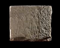 An Egyptian Limestone Relief Fragment Depicting an Offering Scene