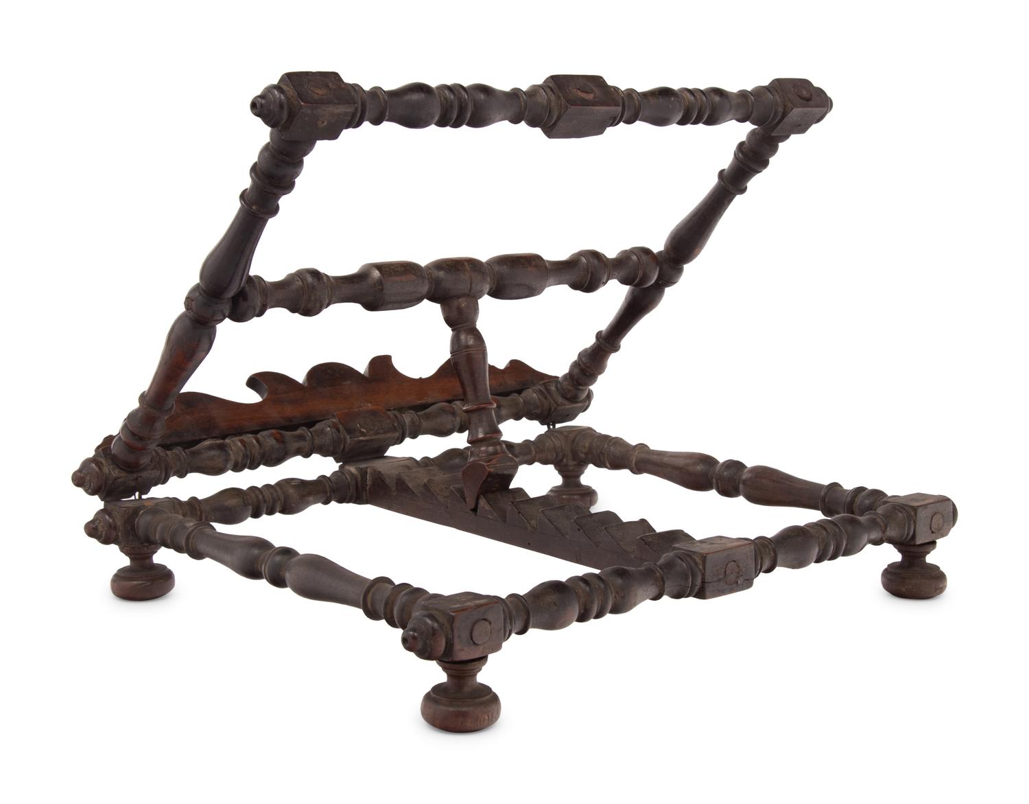 An Italian Carved Walnut Book Stand