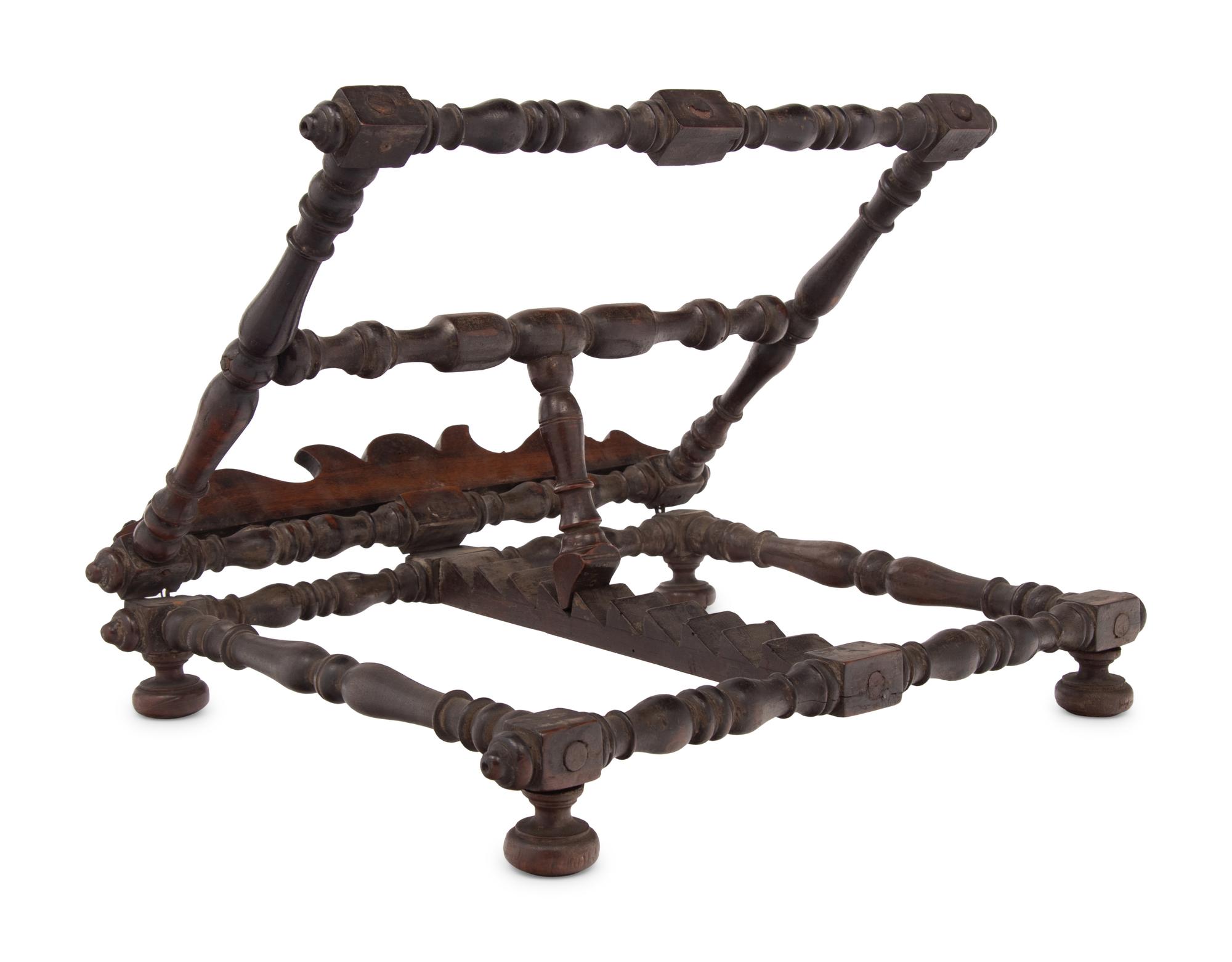 An Italian Carved Walnut Book Stand
