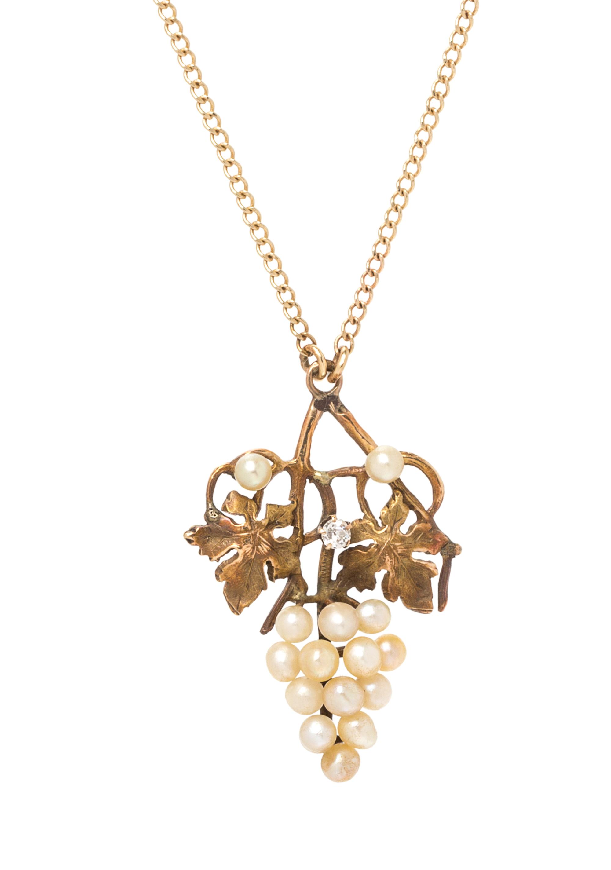A Vintage Yellow Gold, Seed Pearl and Diamond Grape Cluster Motif Pendant, 2.10 dwts.