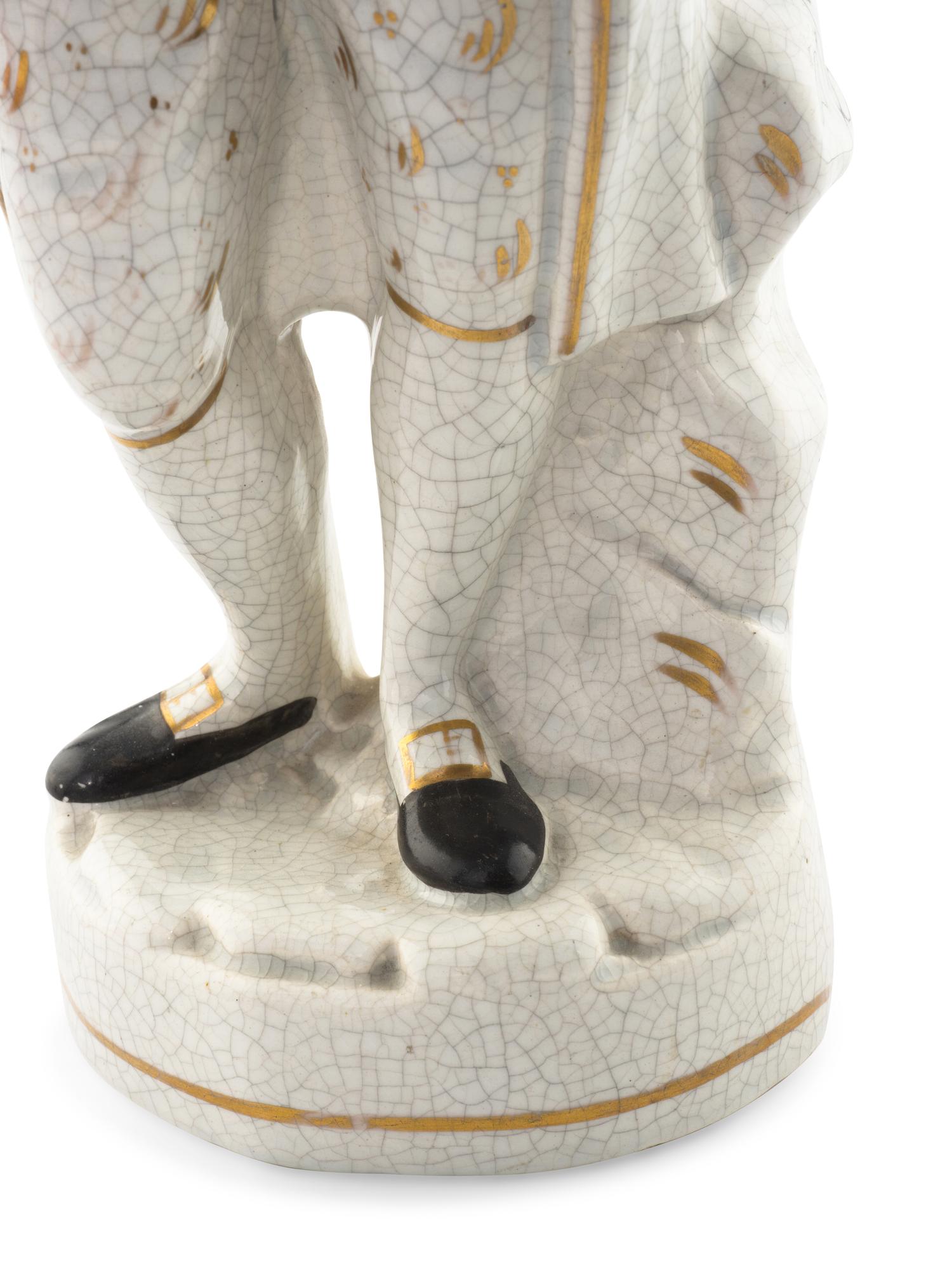 A Staffordshire Ceramic Figure of Benjamin Franklin