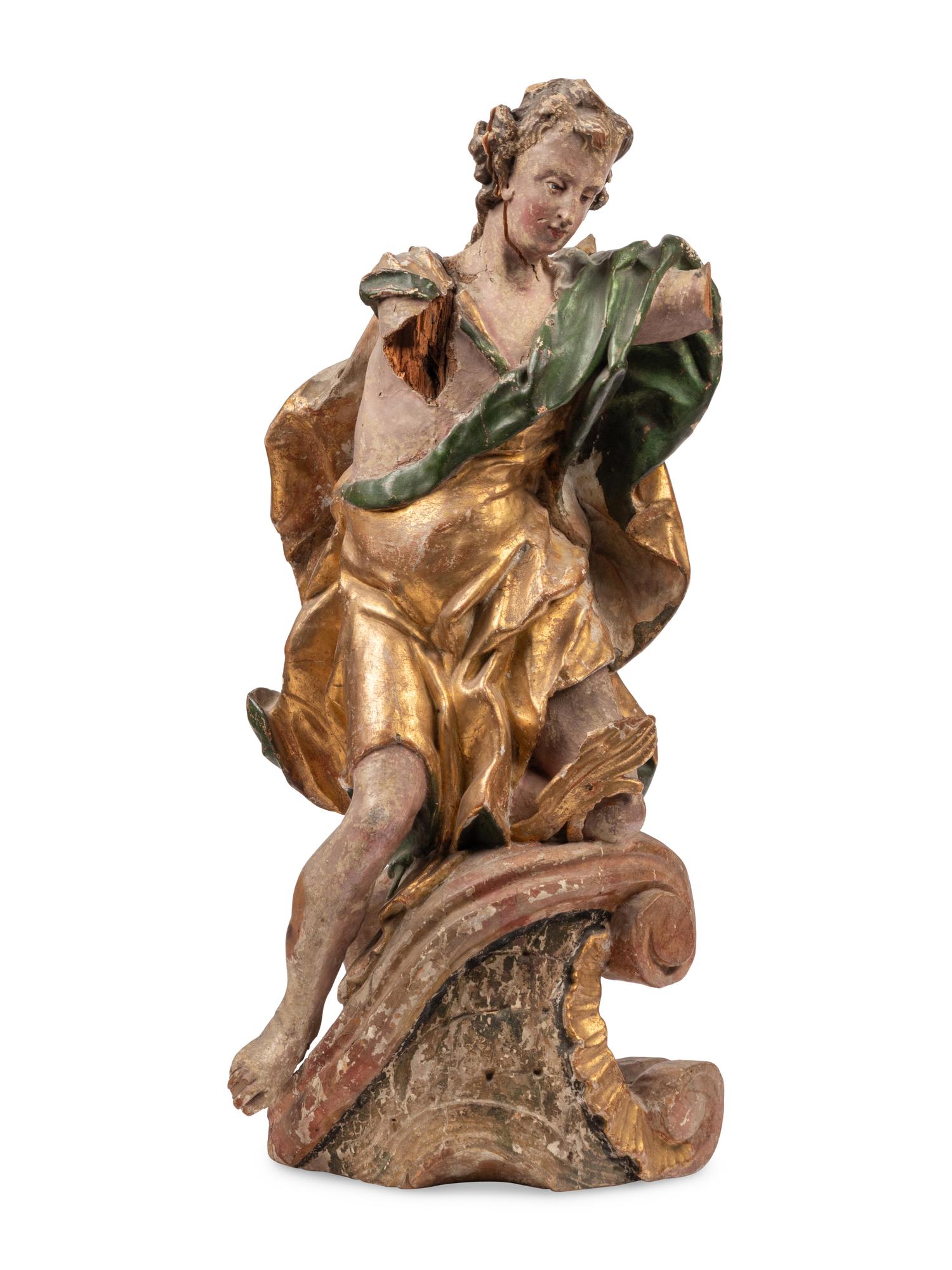 An Italian Polychrome Painted and Parcel-Gilt Figure of a Saint