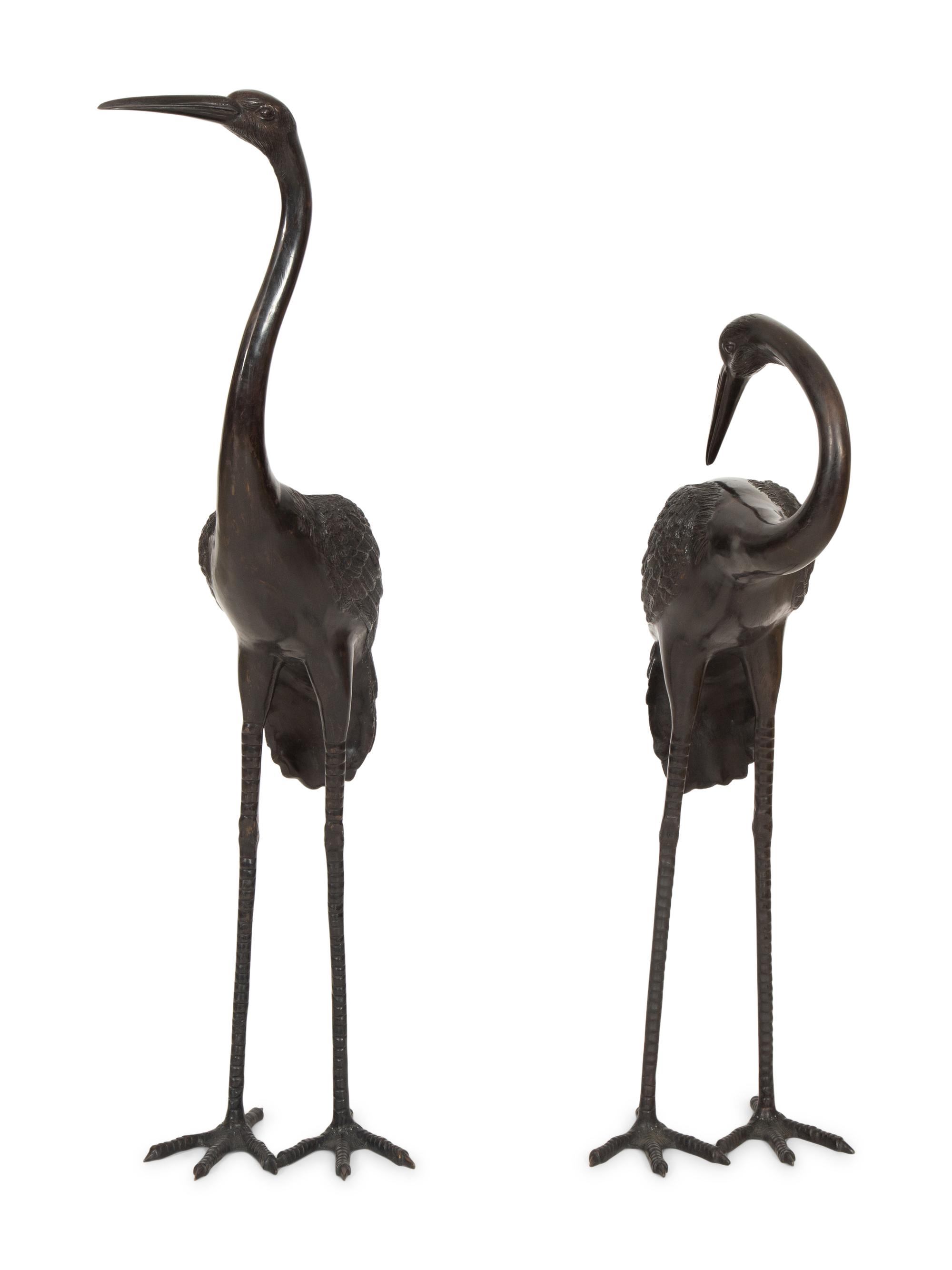 Two Large Cast Metal Models of Cranes