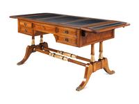 A Regency Style Parcel-Gilt and Part-Ebonized Mahogany Sofa Table