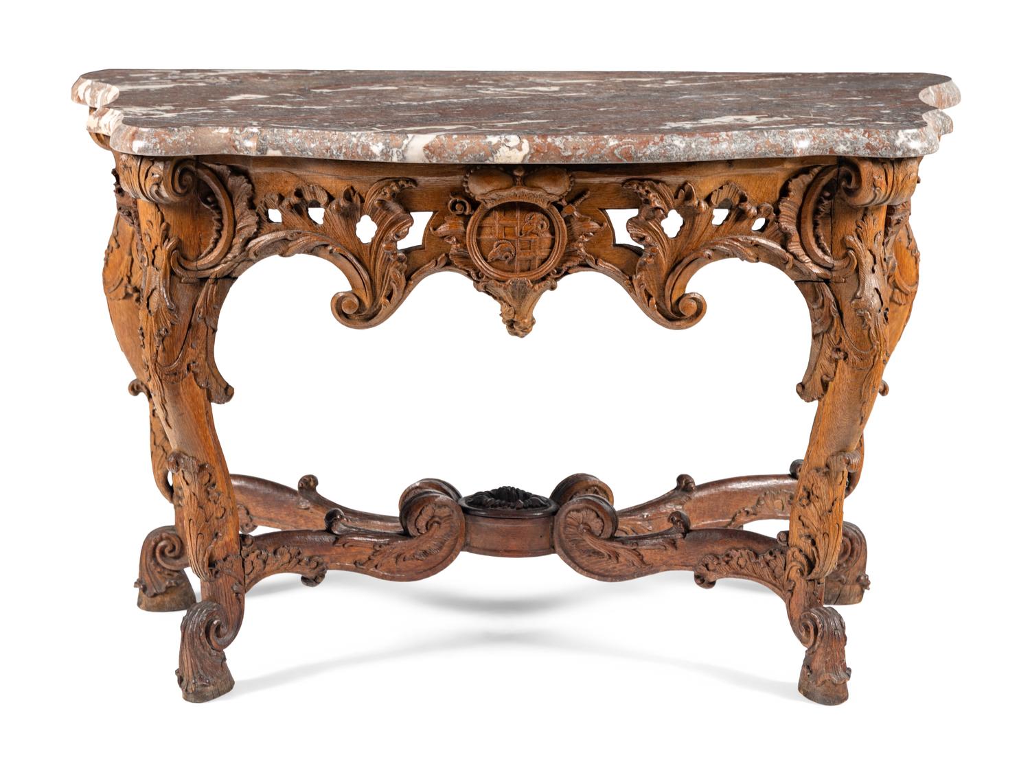 A Pair of Régence Carved Oak Marble-Top Console Tables