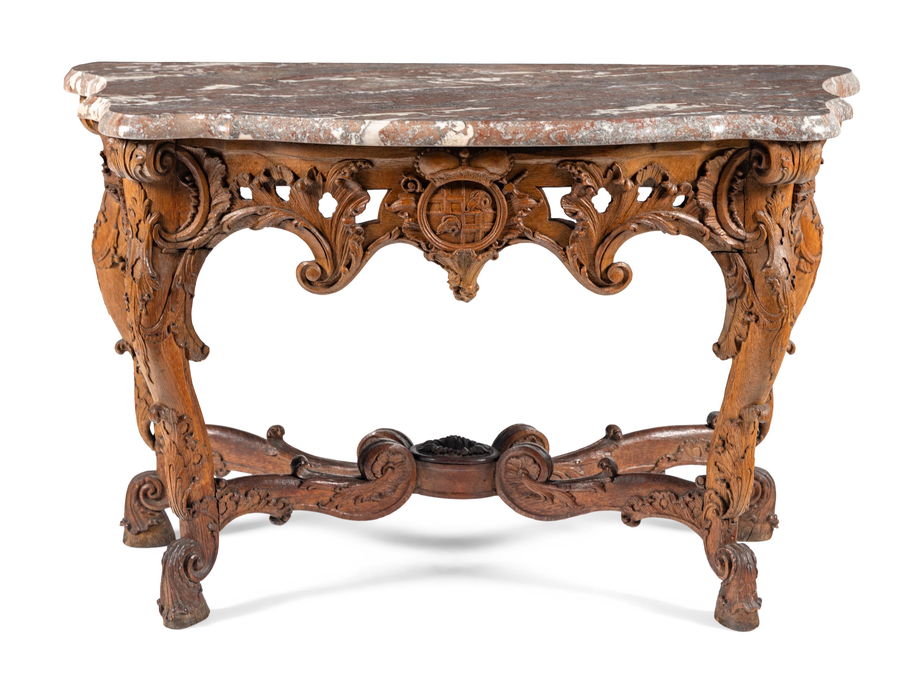A Pair of Régence Carved Oak Marble-Top Console Tables