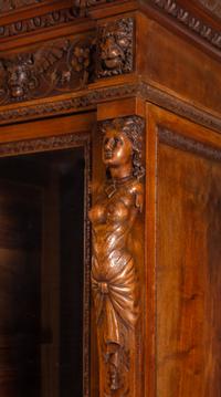 An Italian Renaissance Style Carved Walnut Cabinet