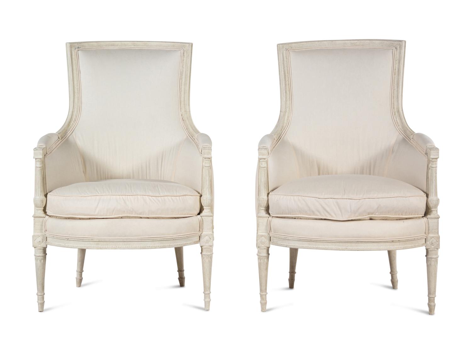 A Pair of Directoire Style White-Painted Bergères