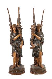 A Pair of Continental Carved and Painted Figural Prickets with Associated Pedestals