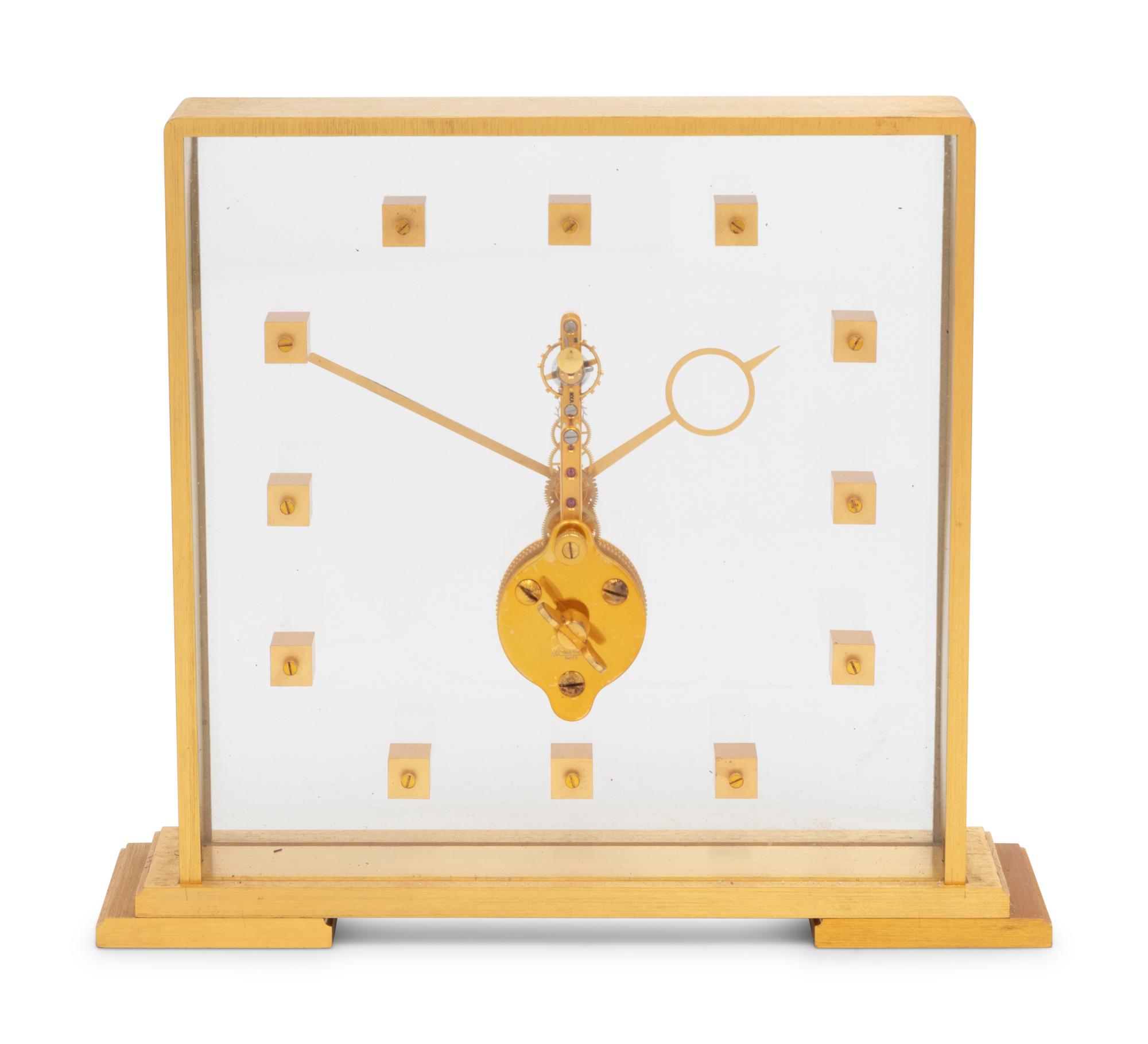 A Jaeger LeCoultre Brass and Glass Clock