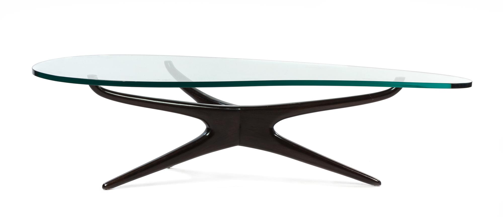 A Vladimir Kagan Walnut Tri-Symmetric Low Table Height 15 1/2 x width 59 x depth 30 inches.