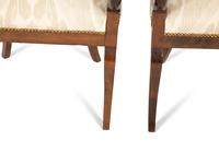 A Pair of Empire Style Mahogany Arm Chairs
