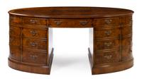 A Georgian Style Burlwood Double Pedestal Desk Height 30 3/4 x width 72 1/2 inches x depth 39 1/2 inches. — 20TH CENTURY