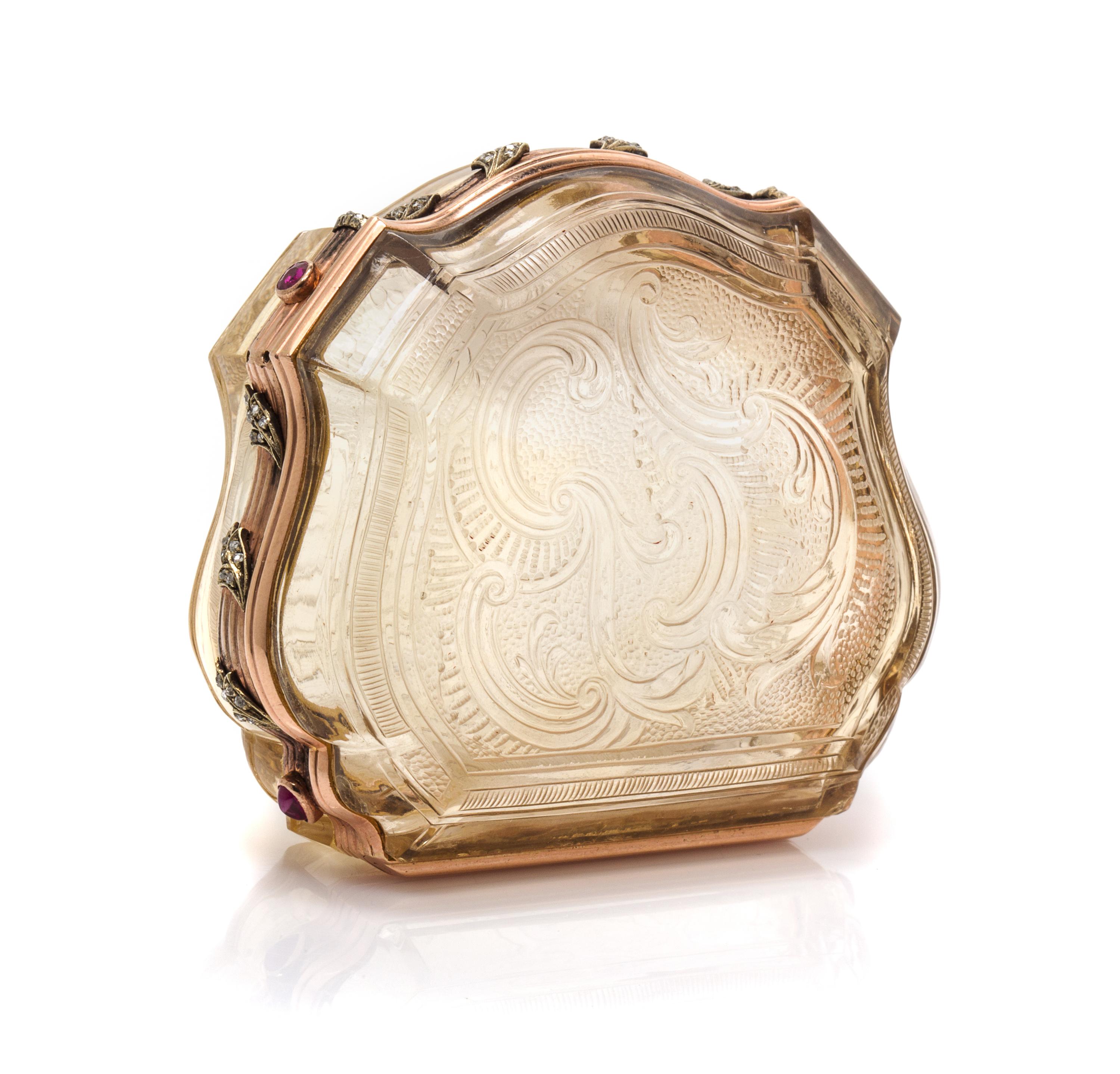A Russian Gold Mounted and Jeweled Carved Topaz Box, St. Petersburg, 19th Century, of shield form with incised rocaille decoration, wit