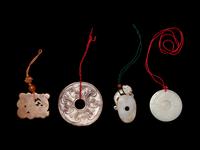 Four Chinese Jade Pendants