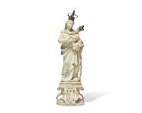 An Italian carved and parcel-gilt alabaster figure of the Madonna of Trapani, Sicily, 18th century, displayed in carved walnut and glass reliquary box, likely 19th century