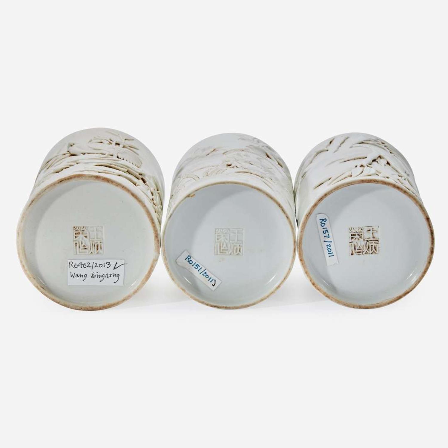 Three Chinese molded and carved porcelain brushpots 瓷塑雕刻笔筒一组三件 Mark of Wang Bingrong ????