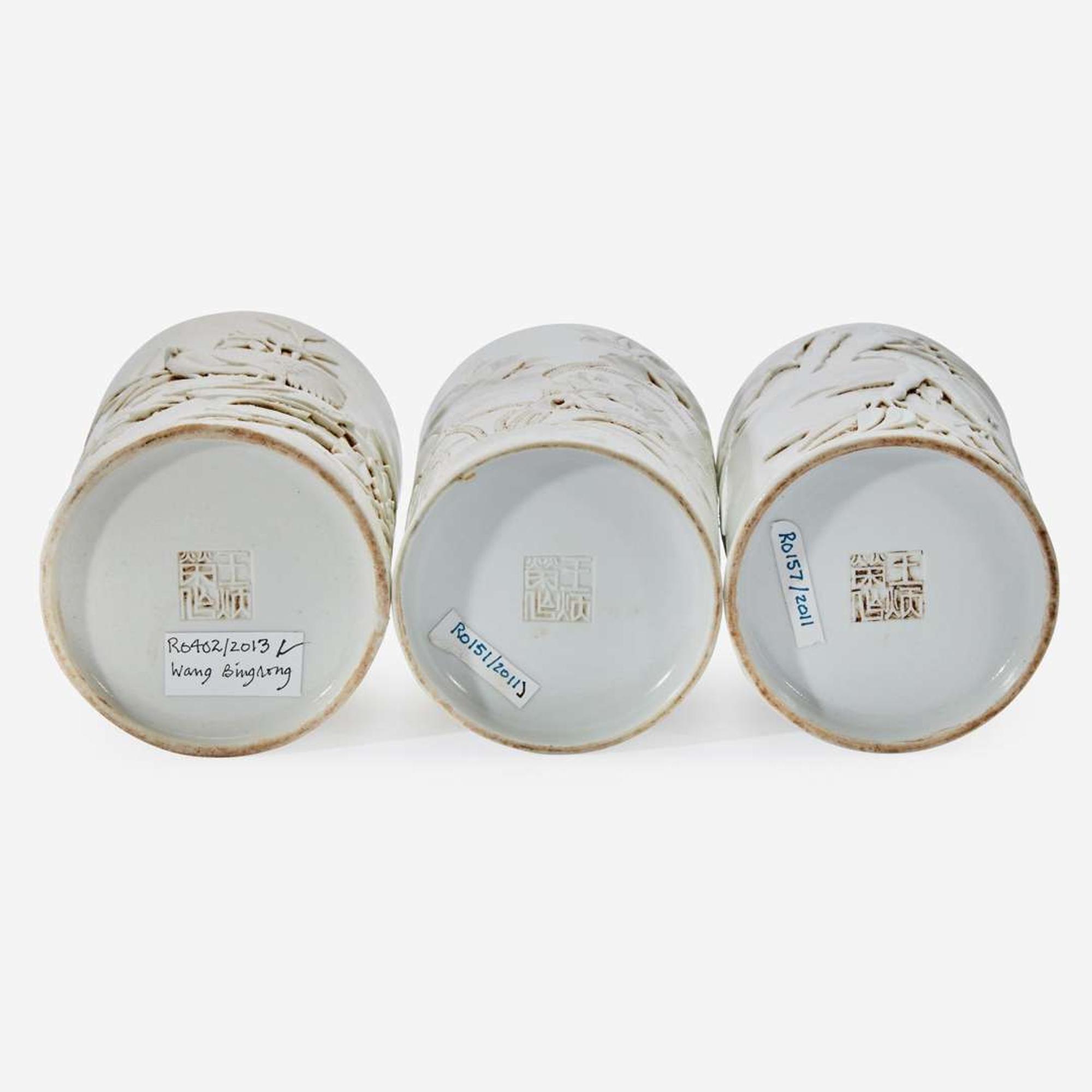 Three Chinese molded and carved porcelain brushpots 瓷塑雕刻笔筒一组三件 Mark of Wang Bingrong ????
