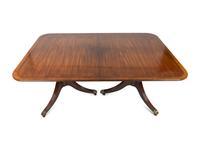 A Regency Style Mahogany Two-pedestal Dining Table by Baker — 20TH CENTURY