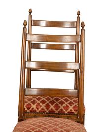 A Set of Six French Provincial Carved Walnut Dining Chairs